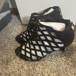 Brand New, never worn Caged black heels!!